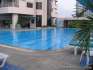 The swimming pool and in the background, the panoramic lift that reaches the foot of the swimming pool.